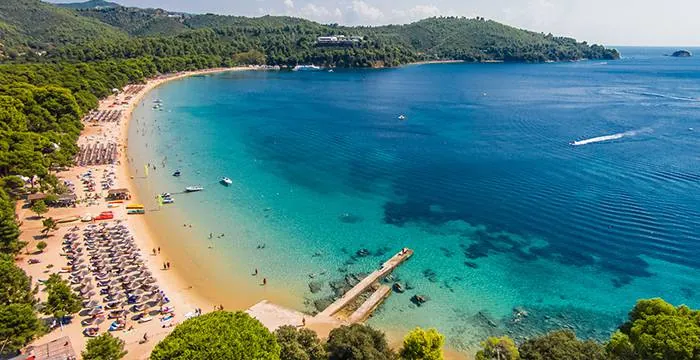 The long sandy beach at Koukounaries from above